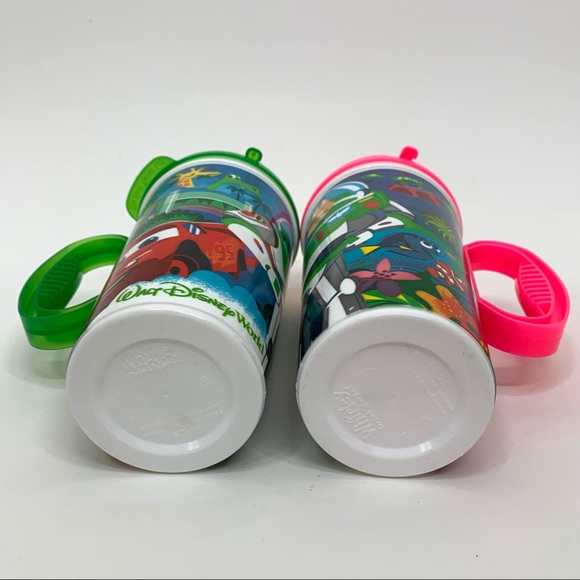 Disney World Set Of Two Neon Whirley Travel Mugs With Handles Buzz Cars Nemo - Picture 14 of 16